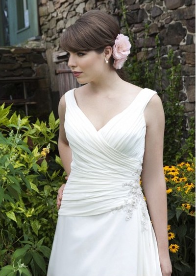 This slightly dropwaist gown is perfect for the shortwaisted bride